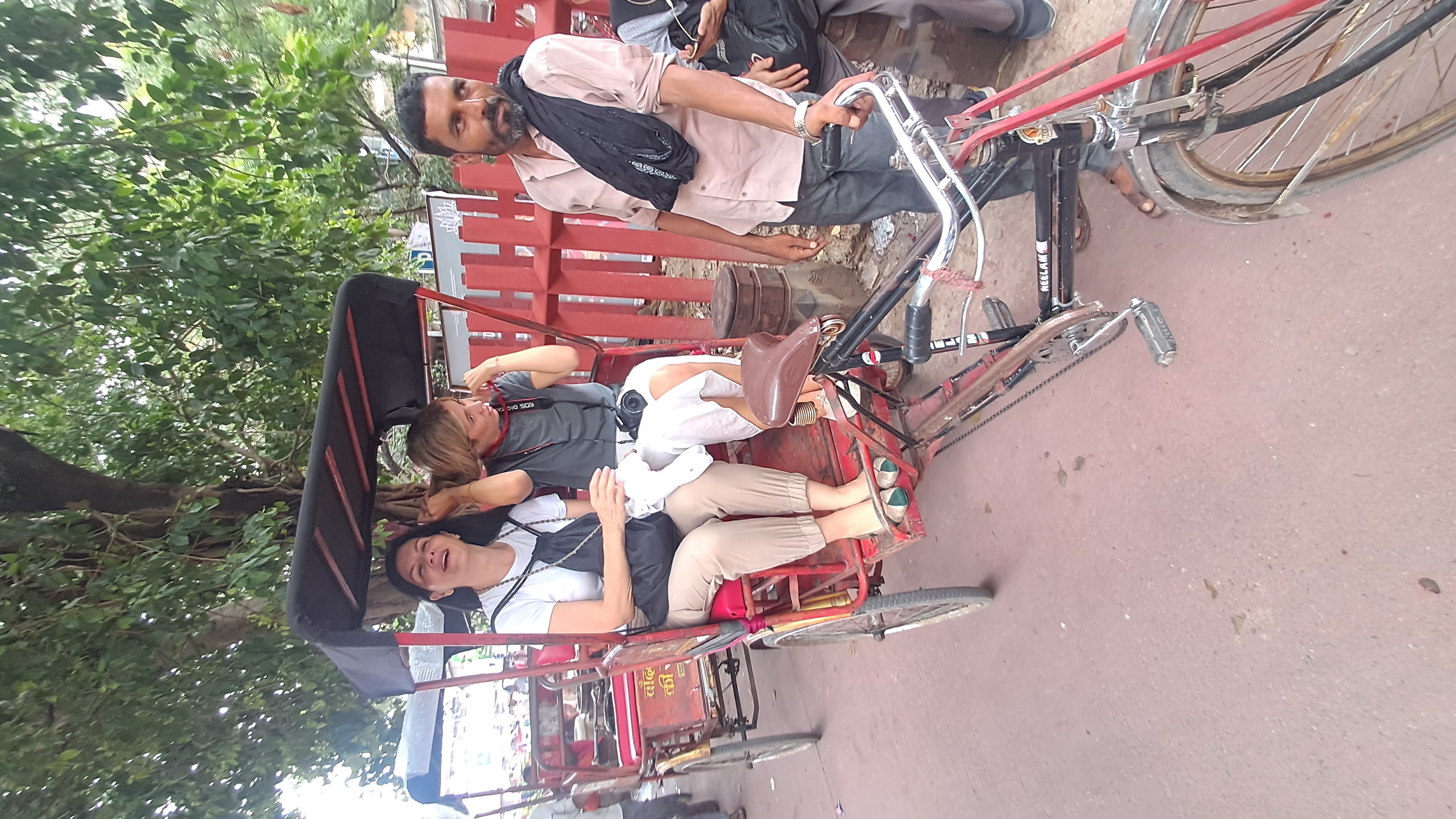 Client enjoying Rikshaw ride in Old Delhi